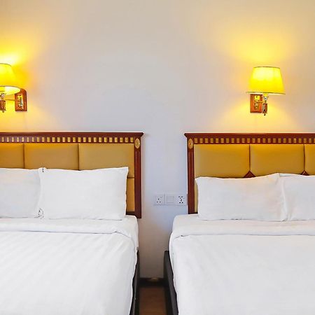 Super Oyo 90464 Borneo Suites Hotel Kota Kinabalu Kültér fotó