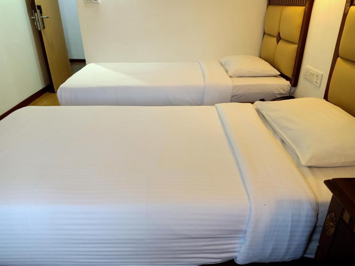 Super Oyo 90464 Borneo Suites Hotel Kota Kinabalu Kültér fotó