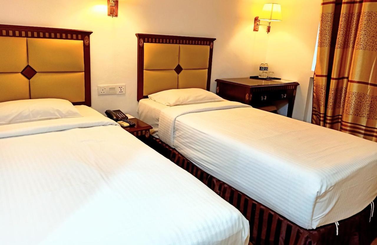 Super Oyo 90464 Borneo Suites Hotel Kota Kinabalu Kültér fotó