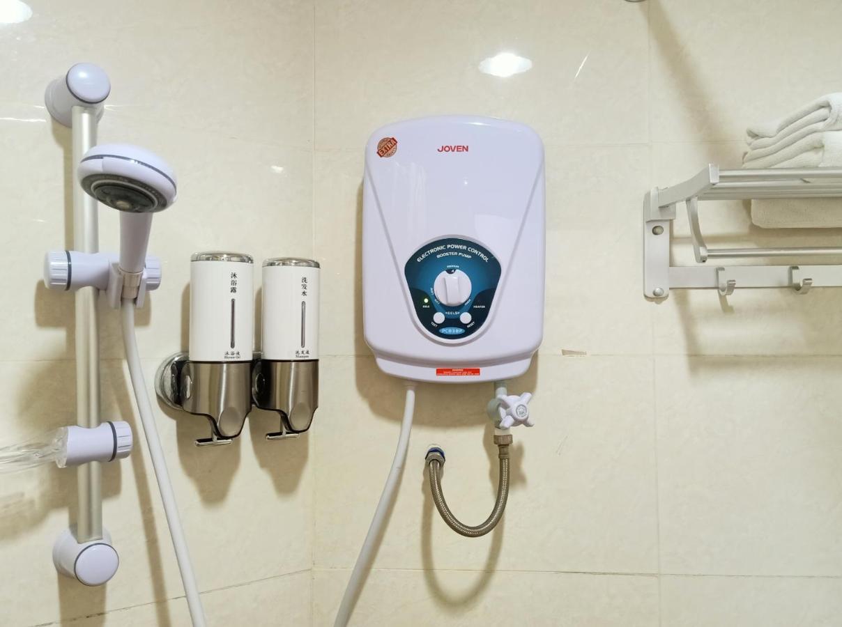 Super Oyo 90464 Borneo Suites Hotel Kota Kinabalu Kültér fotó