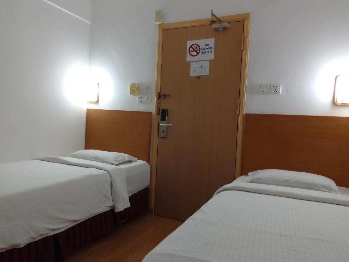 Super Oyo 90464 Borneo Suites Hotel Kota Kinabalu Kültér fotó
