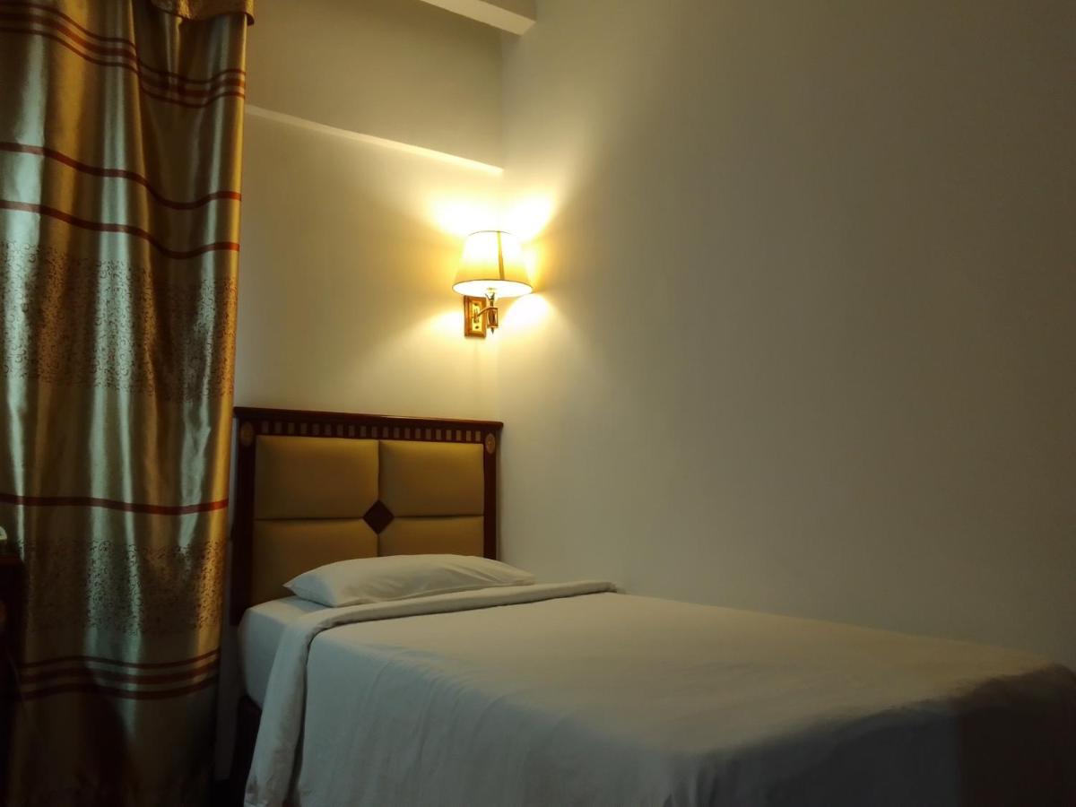 Super Oyo 90464 Borneo Suites Hotel Kota Kinabalu Kültér fotó