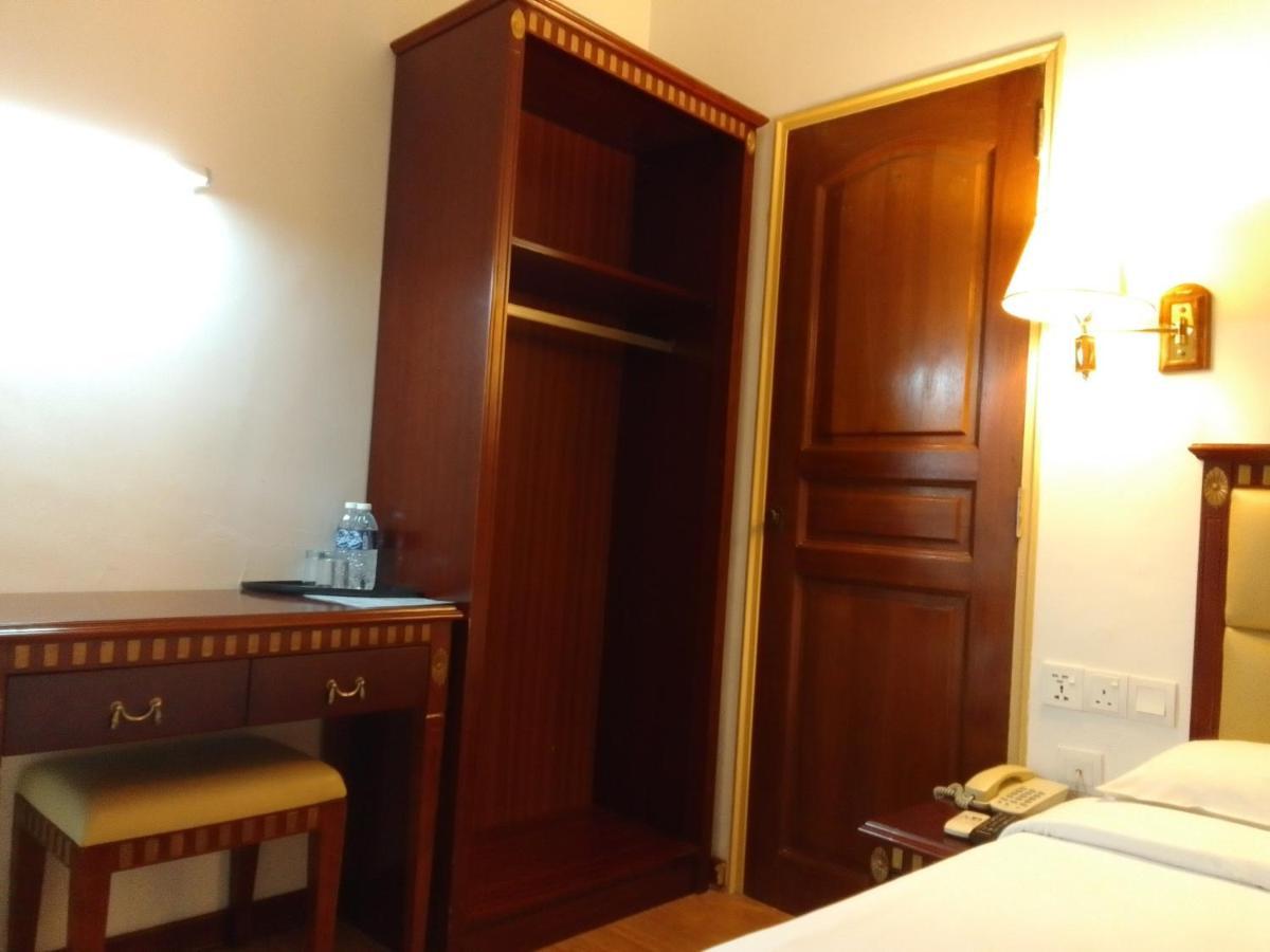 Super Oyo 90464 Borneo Suites Hotel Kota Kinabalu Kültér fotó