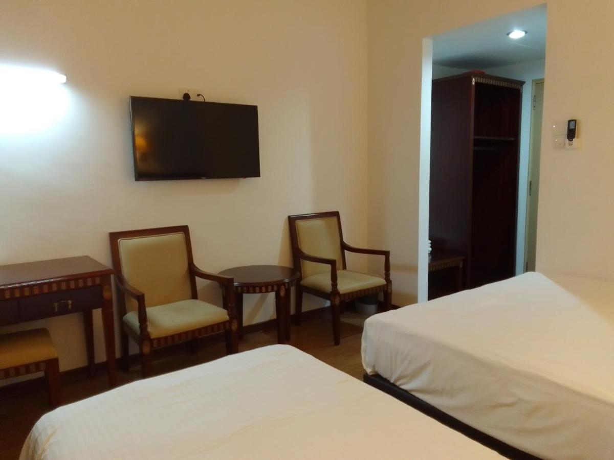 Super Oyo 90464 Borneo Suites Hotel Kota Kinabalu Kültér fotó
