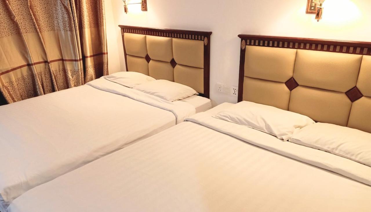Super Oyo 90464 Borneo Suites Hotel Kota Kinabalu Kültér fotó