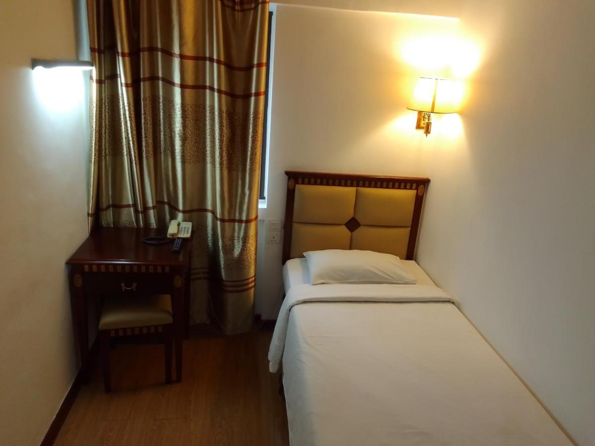 Super Oyo 90464 Borneo Suites Hotel Kota Kinabalu Kültér fotó