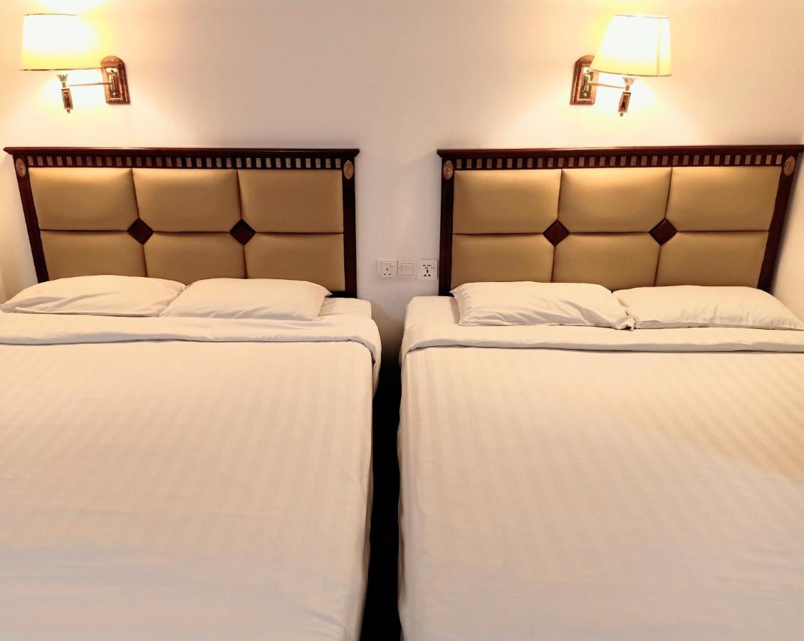 Super Oyo 90464 Borneo Suites Hotel Kota Kinabalu Kültér fotó