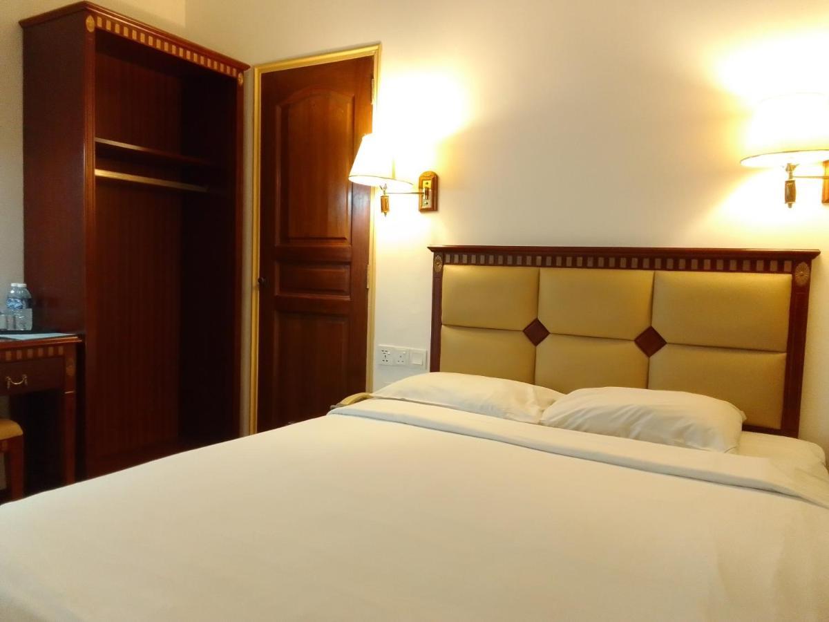 Super Oyo 90464 Borneo Suites Hotel Kota Kinabalu Kültér fotó