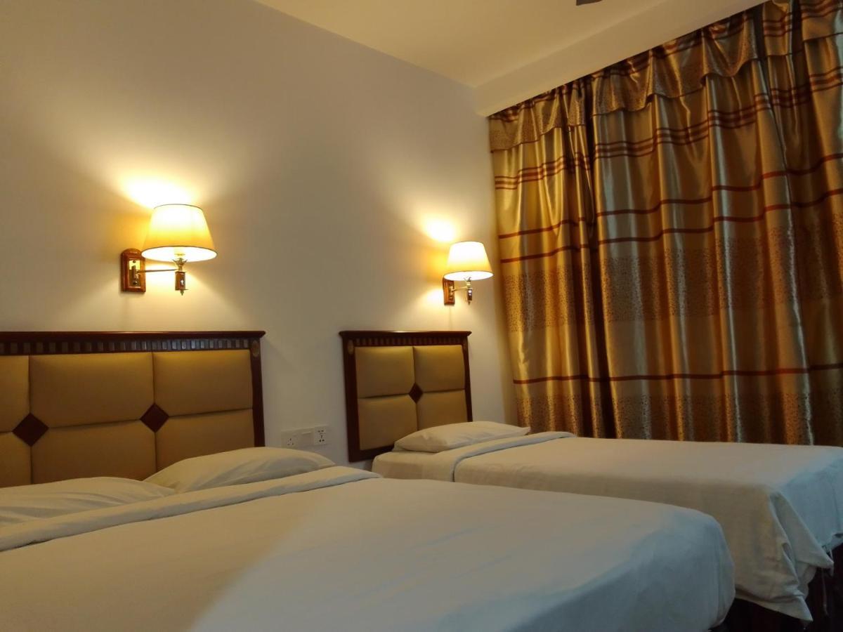 Super Oyo 90464 Borneo Suites Hotel Kota Kinabalu Kültér fotó