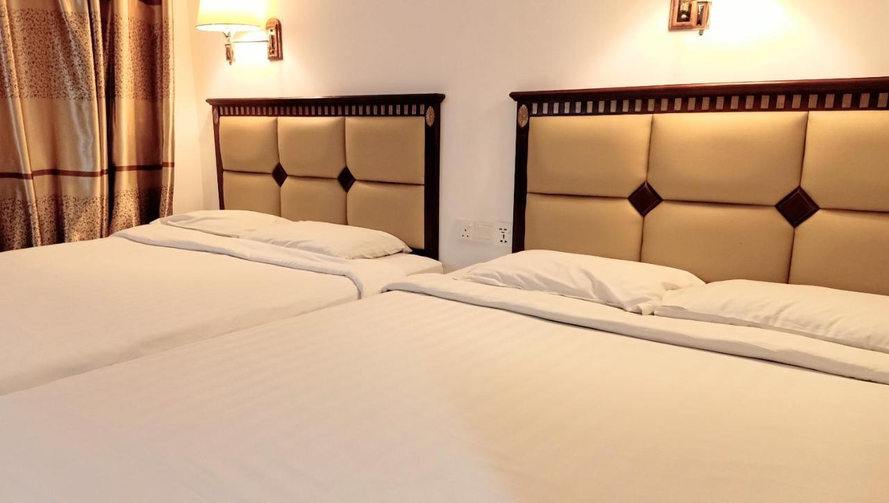 Super Oyo 90464 Borneo Suites Hotel Kota Kinabalu Kültér fotó