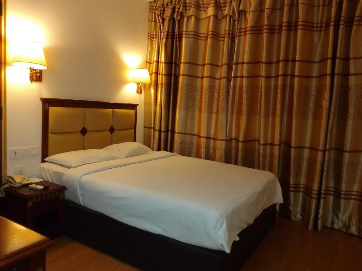 Super Oyo 90464 Borneo Suites Hotel Kota Kinabalu Kültér fotó