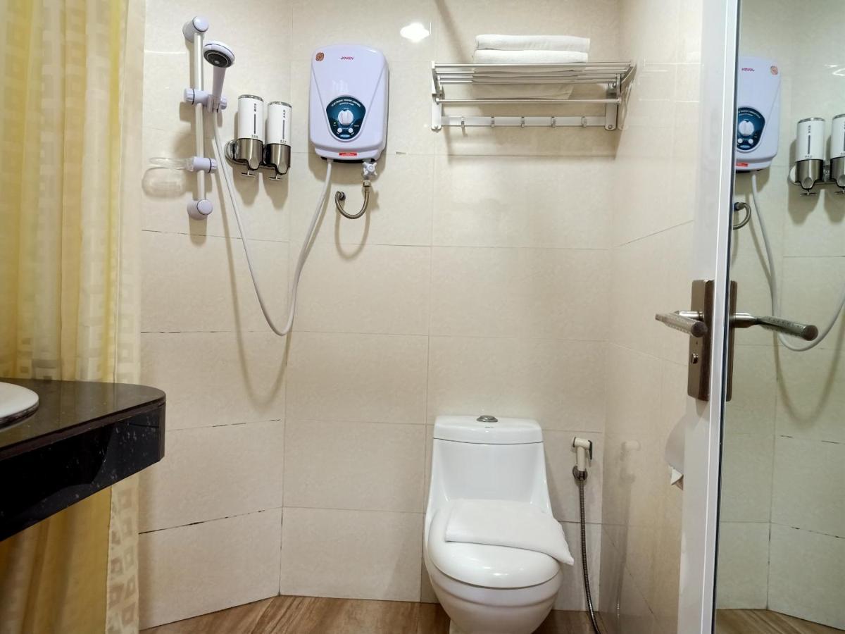 Super Oyo 90464 Borneo Suites Hotel Kota Kinabalu Kültér fotó