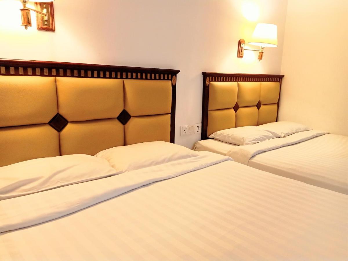 Super Oyo 90464 Borneo Suites Hotel Kota Kinabalu Kültér fotó